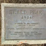 Memorial plaque on Heald Peak honoring Weldon Heald, founder of HPS
