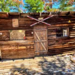 Old ski lift cabin on the summit of Kratka Ridge
