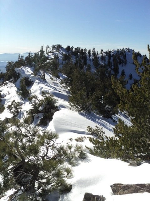 Summit of Snowy Peak with snow
