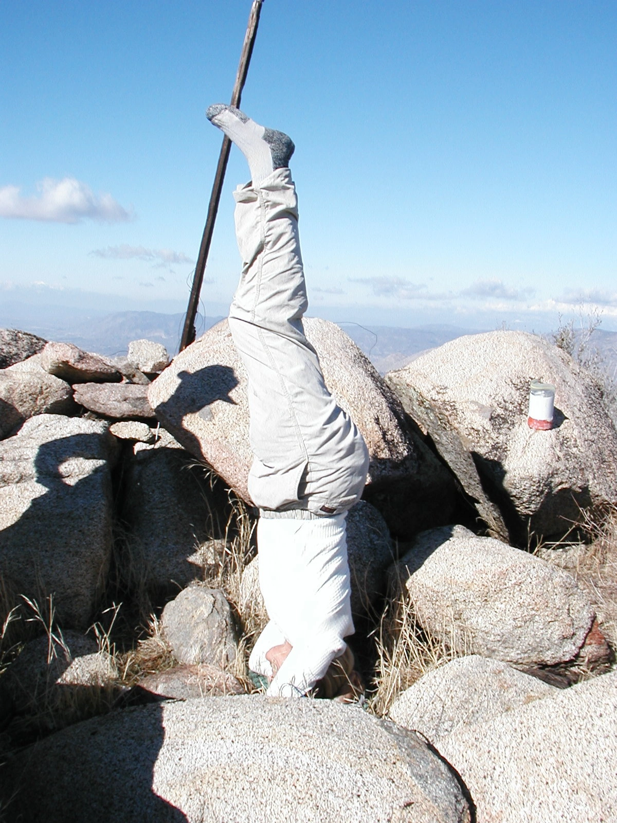 Edith Liu doing a headstand on Rouse Hill